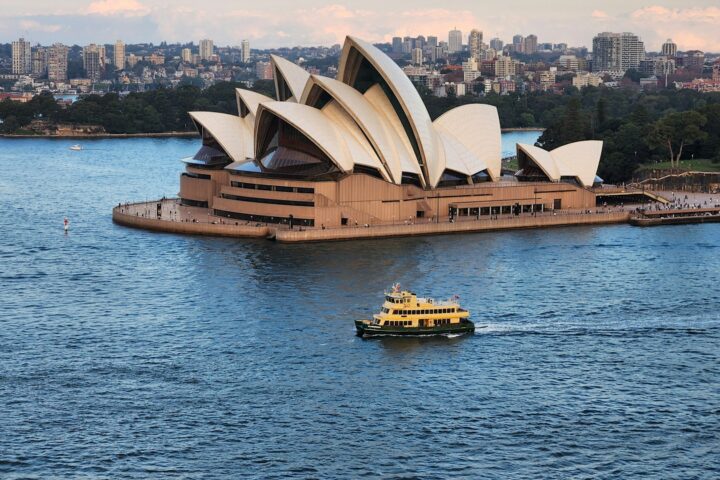 Sydney Opera House and harbour with a ferry passing