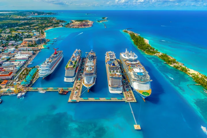 Five cruise ships from different lines docked side by side in Nassau, Bahamas