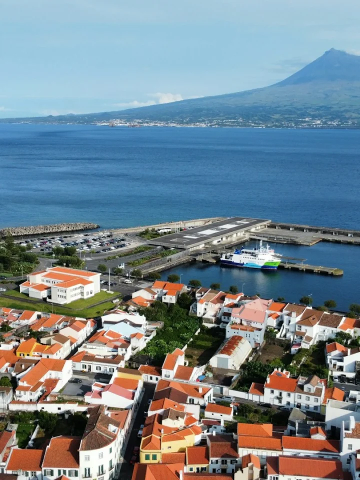 Harbor and town of Horta in the Azores with Pico mountain across the water
